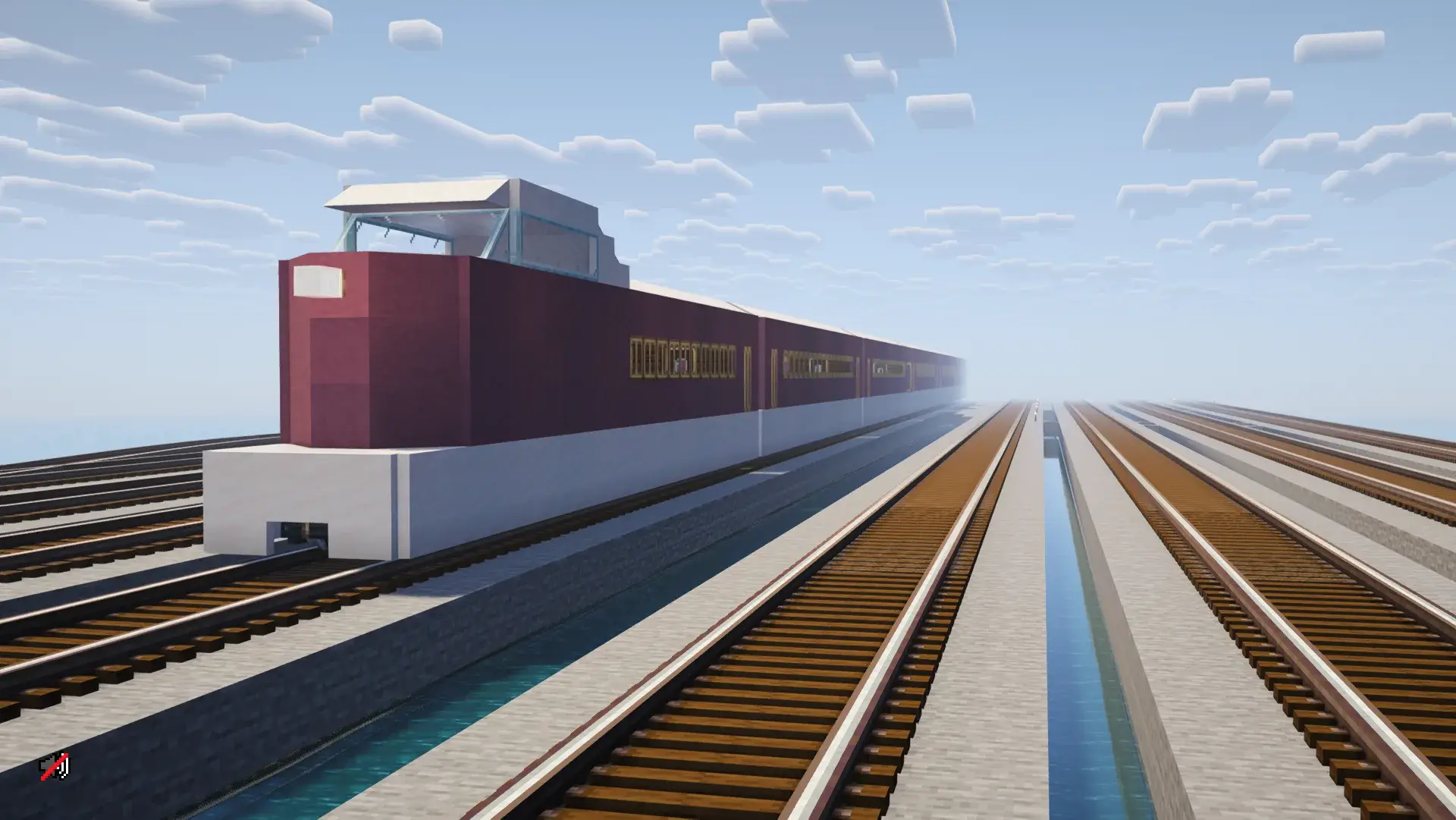 Long train pourpre et blanc circulant sur un réseau de voies ferrées aériennes